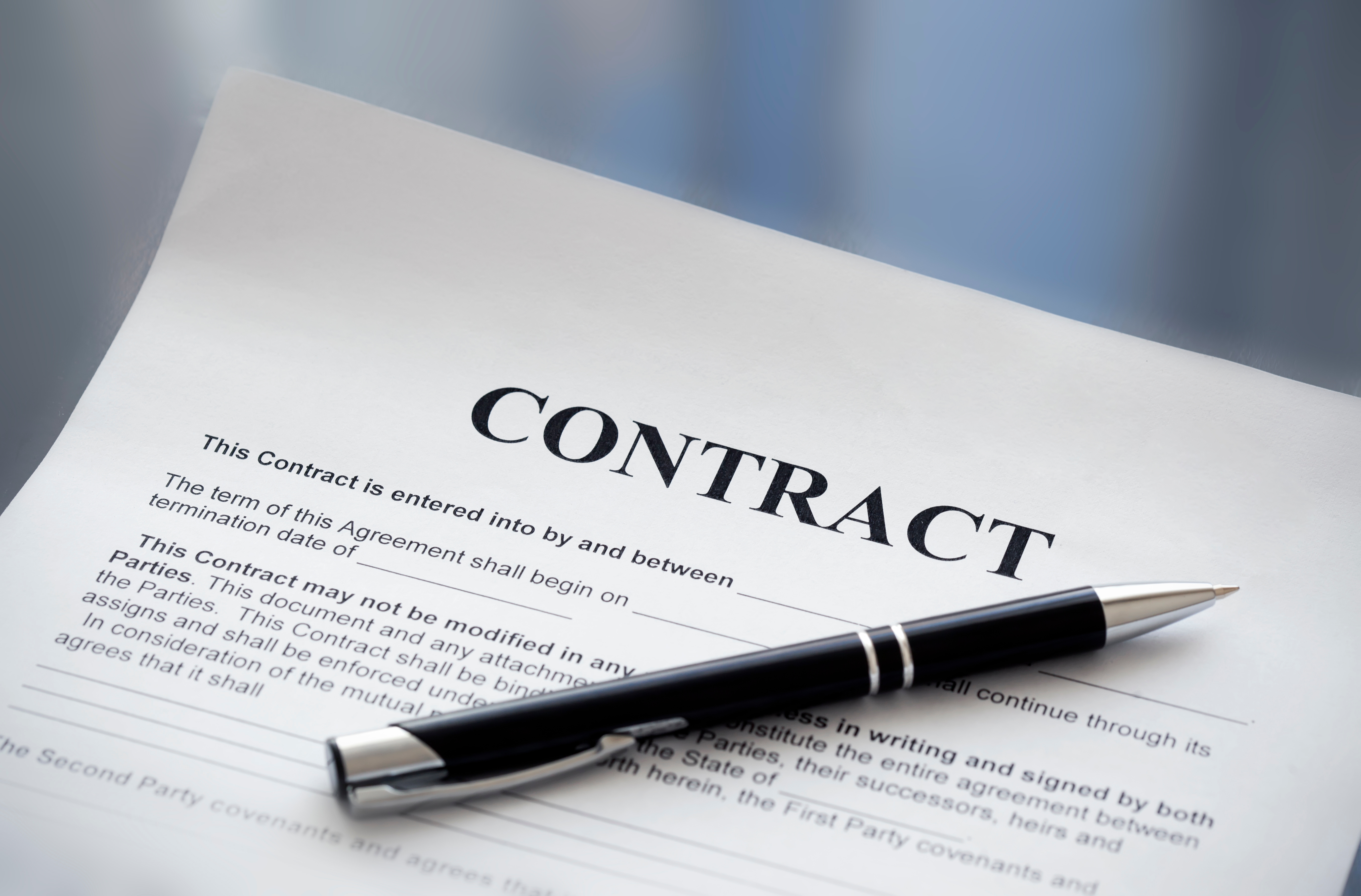 Pen on the contract papers